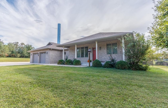 ranch-style house featuring a garage, a porch, and a front lawn