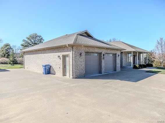 view of home's exterior featuring a garage