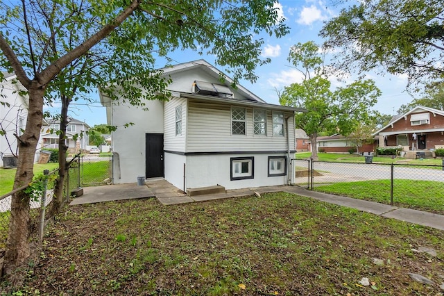 exterior space featuring a front lawn