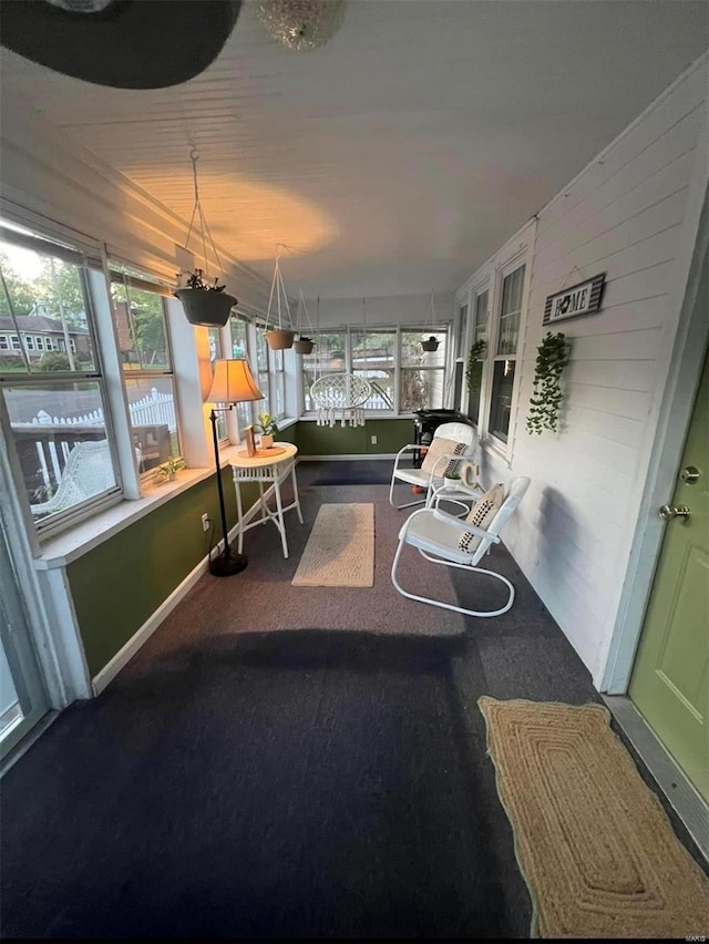 sunroom / solarium featuring a wealth of natural light