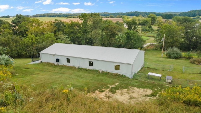 birds eye view of property featuring a rural view