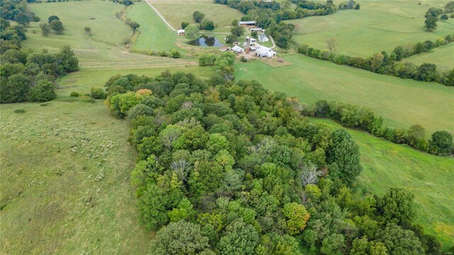 birds eye view of property featuring a rural view