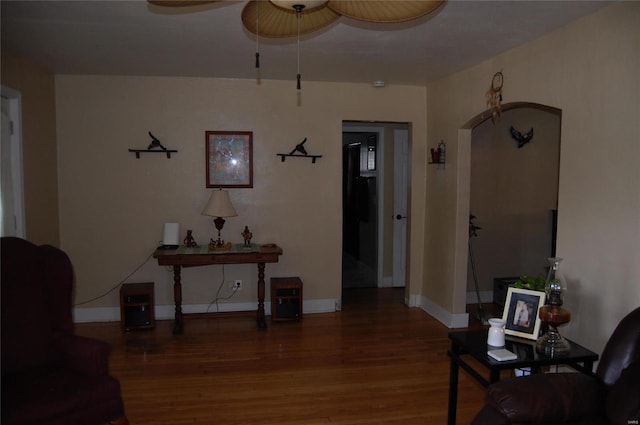 interior space with ceiling fan and hardwood / wood-style floors