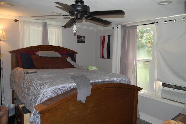 bedroom featuring ceiling fan and ornamental molding