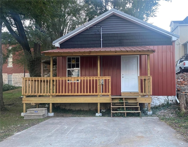 view of front of home with a wooden deck