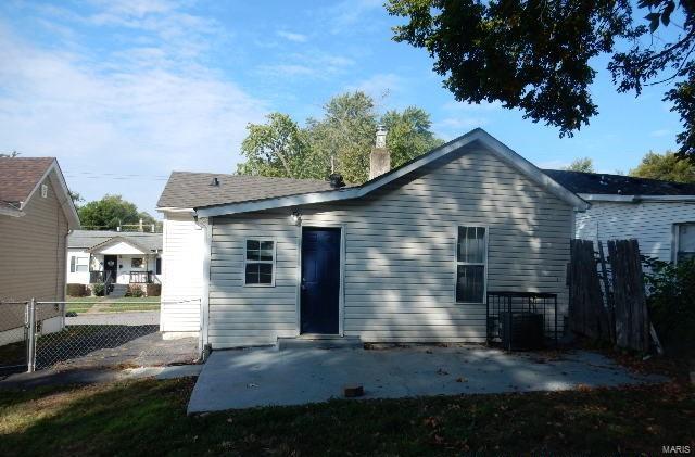 rear view of property with a patio area