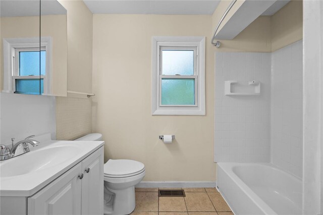 full bathroom featuring tile patterned floors, bathing tub / shower combination, vanity, and toilet