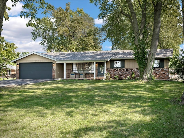 ranch-style house with a front lawn and a garage