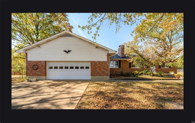 ranch-style home featuring a garage