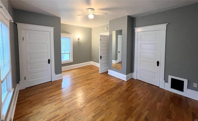 unfurnished bedroom featuring ceiling fan and light hardwood / wood-style flooring