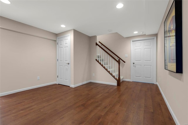 basement featuring dark wood-type flooring