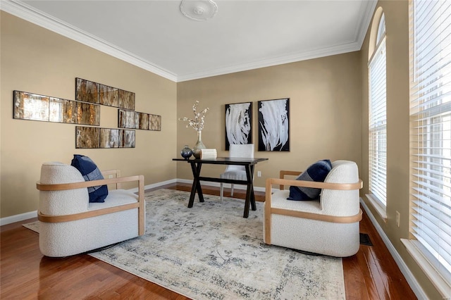 office area featuring hardwood / wood-style flooring, ornamental molding, and plenty of natural light