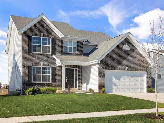 traditional-style house with an attached garage, brick siding, a front yard, and driveway
