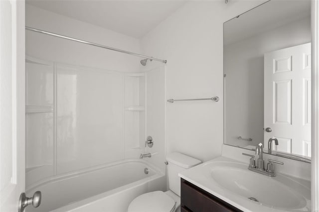 full bathroom featuring washtub / shower combination, toilet, and vanity