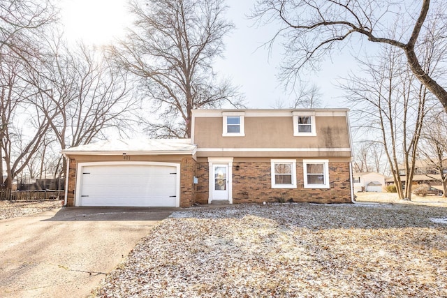 front of property featuring a garage