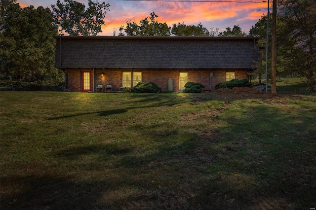 view of front of home featuring a yard