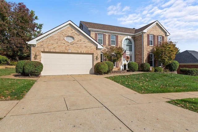 view of front of house with a front lawn and a garage