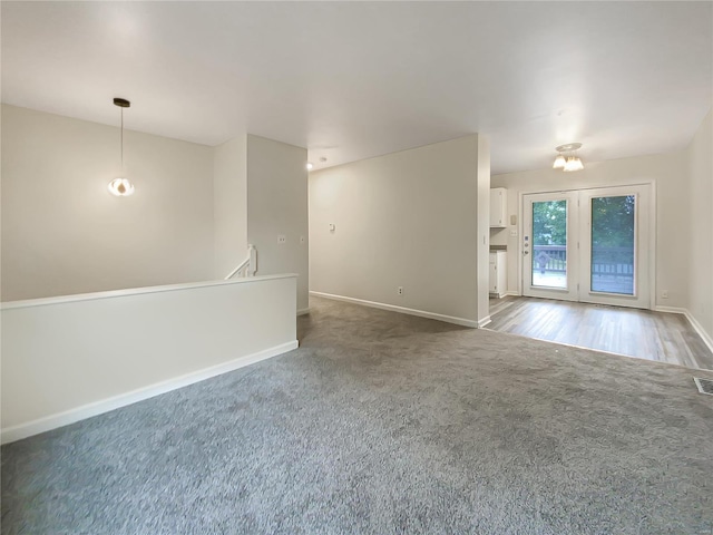 spare room featuring hardwood / wood-style flooring