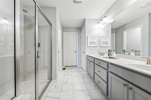 bathroom featuring vanity and walk in shower