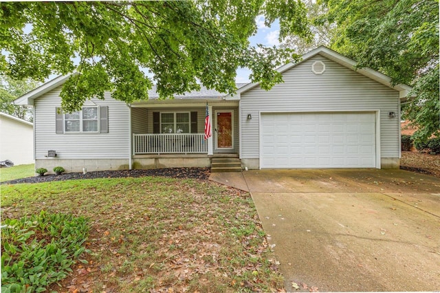 single story home with a garage and covered porch