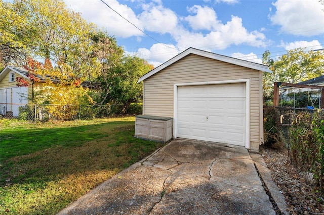 garage with a lawn