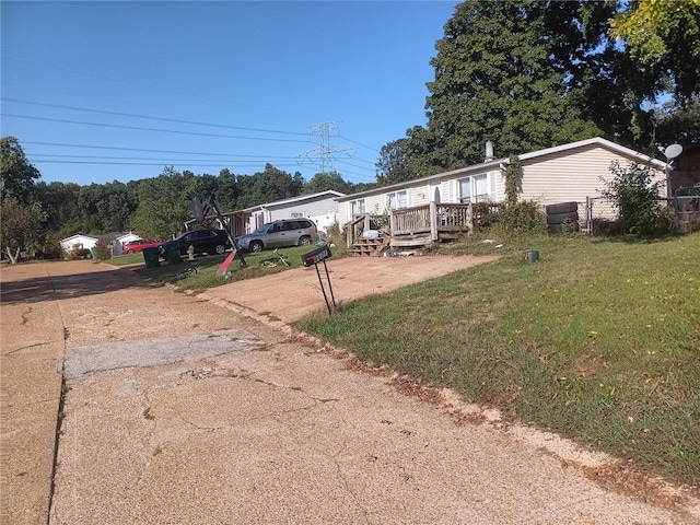 view of yard featuring a wooden deck