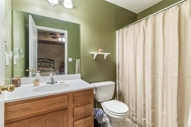 bathroom with ceiling fan, vanity, toilet, and a shower with shower curtain