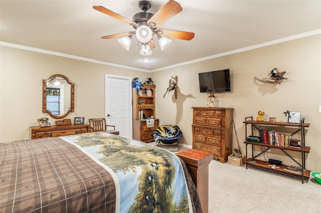 carpeted bedroom featuring ornamental molding and ceiling fan