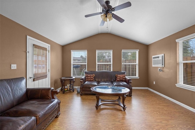 living room featuring a wall mounted AC, ceiling fan, light hardwood / wood-style floors, and lofted ceiling