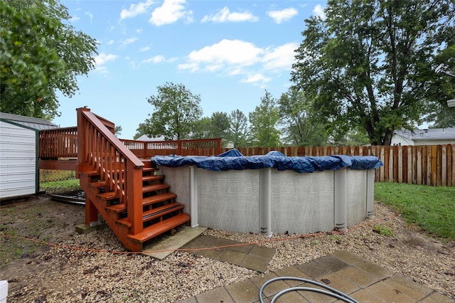 view of pool with a deck