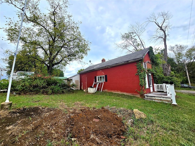 view of property exterior featuring a yard