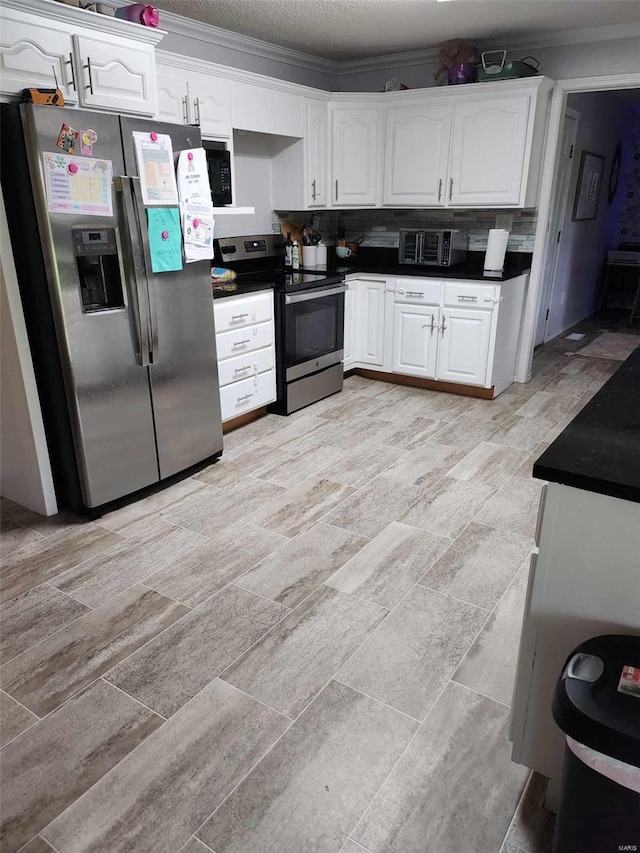 kitchen featuring white cabinetry, backsplash, stainless steel appliances, light wood-type flooring, and crown molding