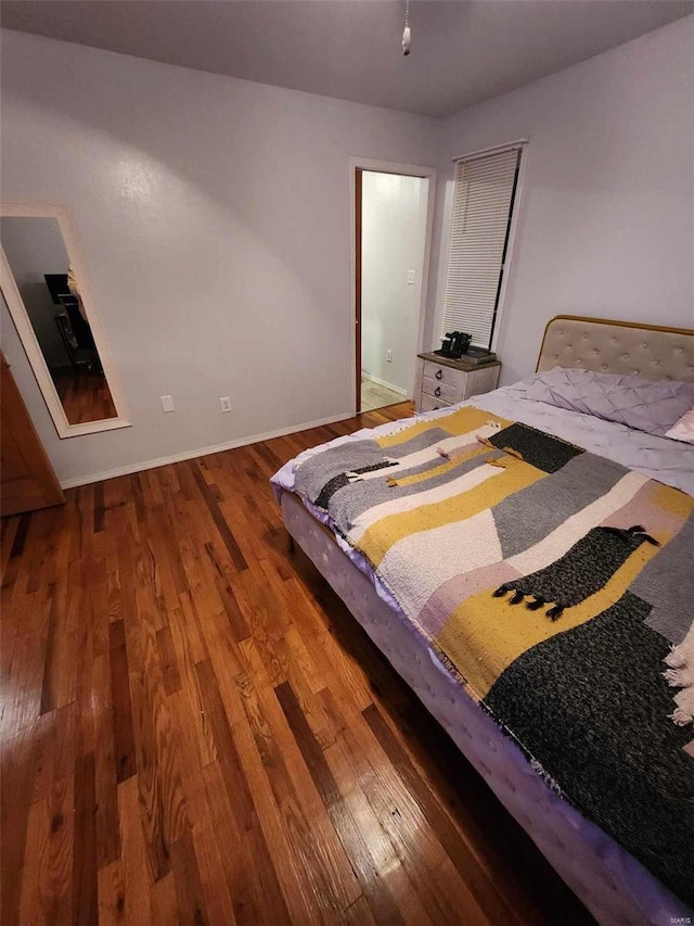 bedroom featuring hardwood / wood-style floors