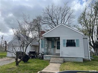 bungalow with a front lawn