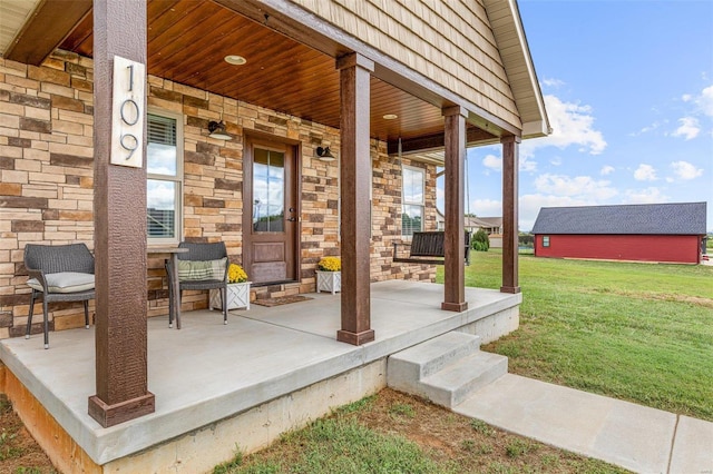 view of patio featuring a porch