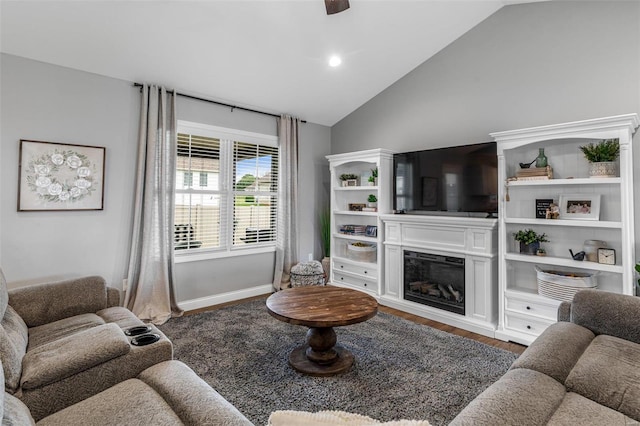 living room with wood-type flooring and vaulted ceiling