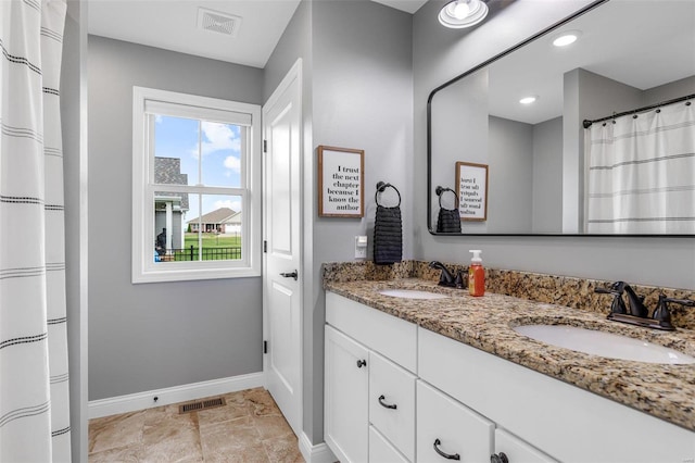 bathroom featuring vanity