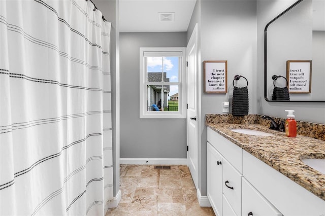 bathroom featuring vanity