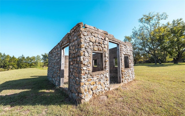 exterior space with a yard