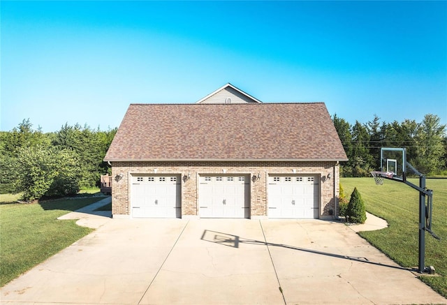 garage with a lawn