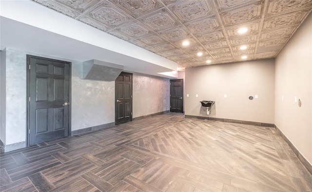 basement featuring dark parquet floors