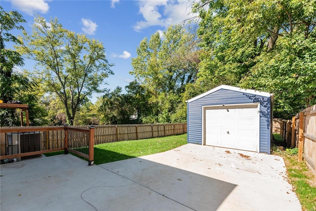 garage featuring a yard