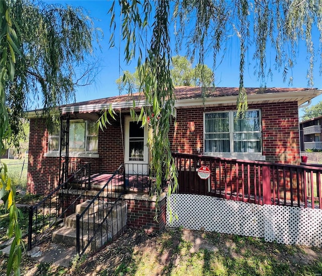 view of front of home with a wooden deck