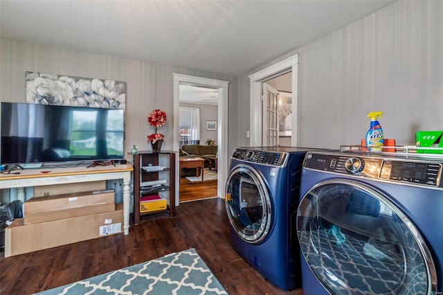 laundry room featuring independent washer and dryer and dark hardwood / wood-style flooring