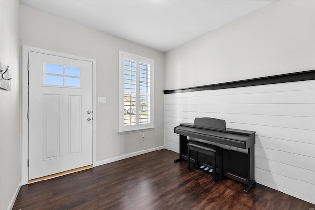 entryway with dark wood-type flooring