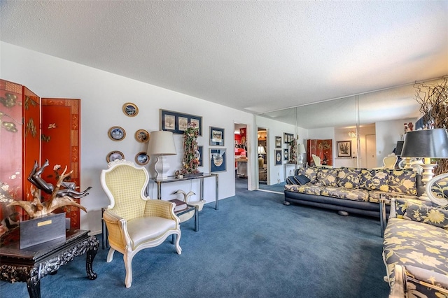 carpeted living room with a textured ceiling