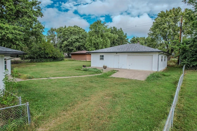 view of yard featuring a garage