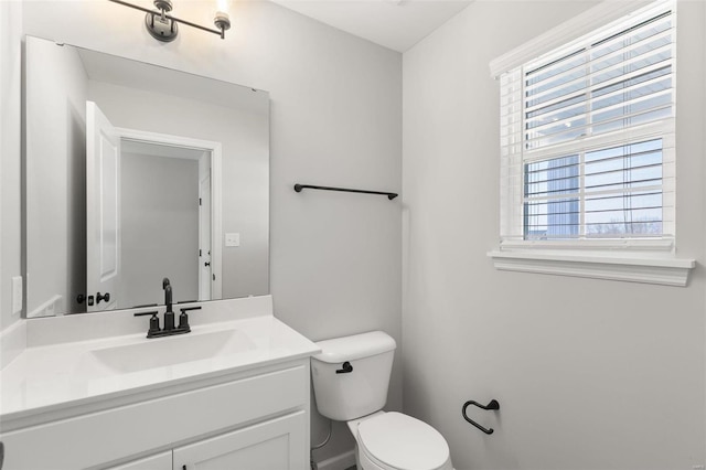 half bath with toilet and vanity