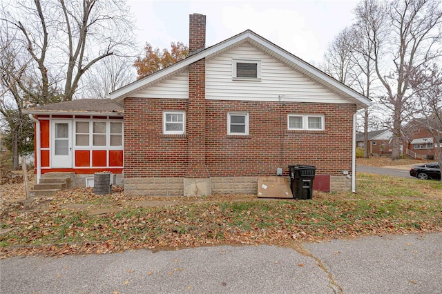 view of property exterior featuring central AC