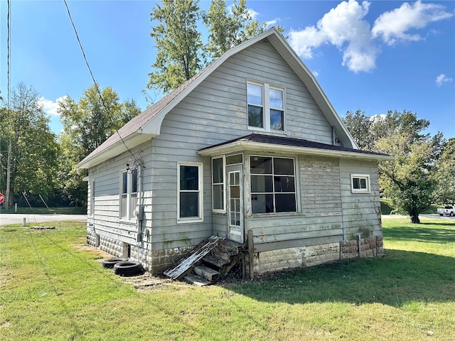 bungalow with a front lawn